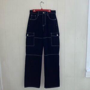 Black wide leg jeans with white stitching detail
